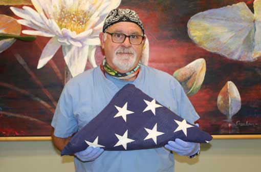 Marc Kagan holding flag