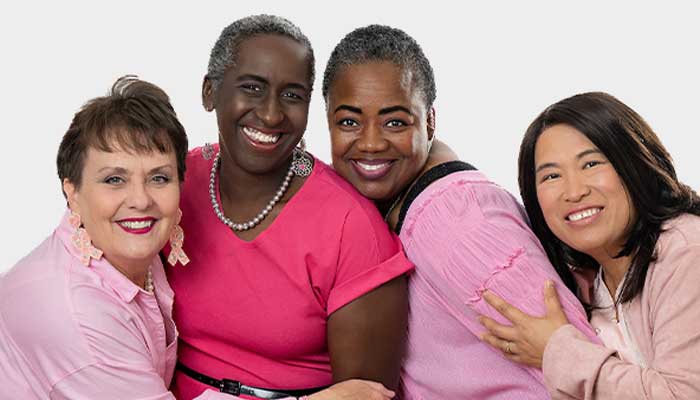 4 breast cancer survivors from Aiken Regional Medical Centers, all wearing pink shirts