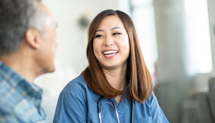 Female doctor with male patient