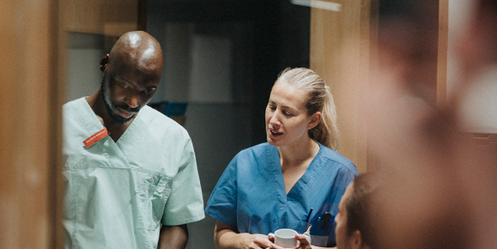 GettyImages-1765296291 Man and Woman working in hospital