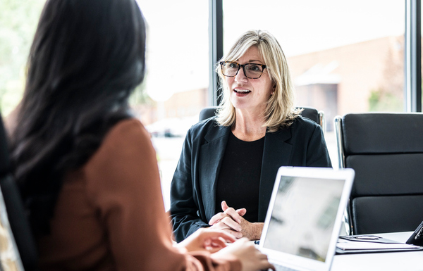 GettyImages-2155192217 Businesswomen meeting in modern conference room