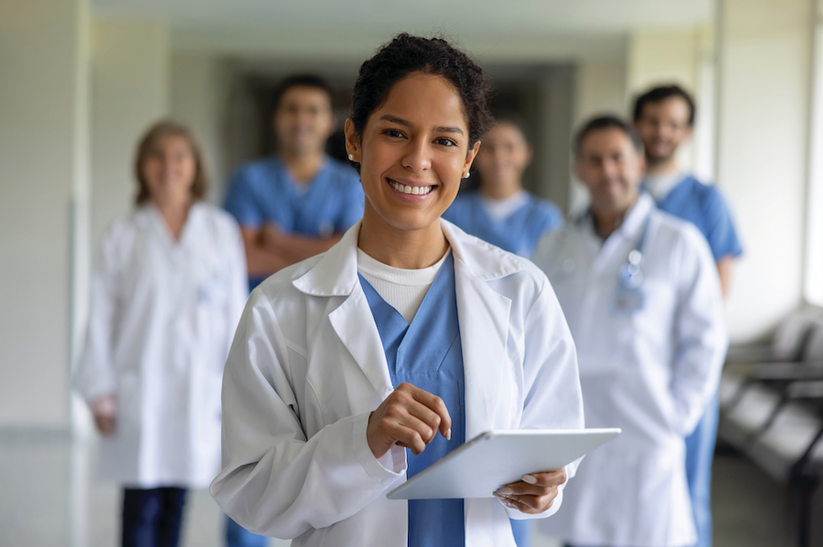 A group of diverse doctors looking at the camera